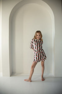Child wearing the Berry Stripe Set, back view