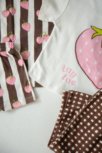 Close-up of the strawberry stripe fabric on the Berry Stripe Set