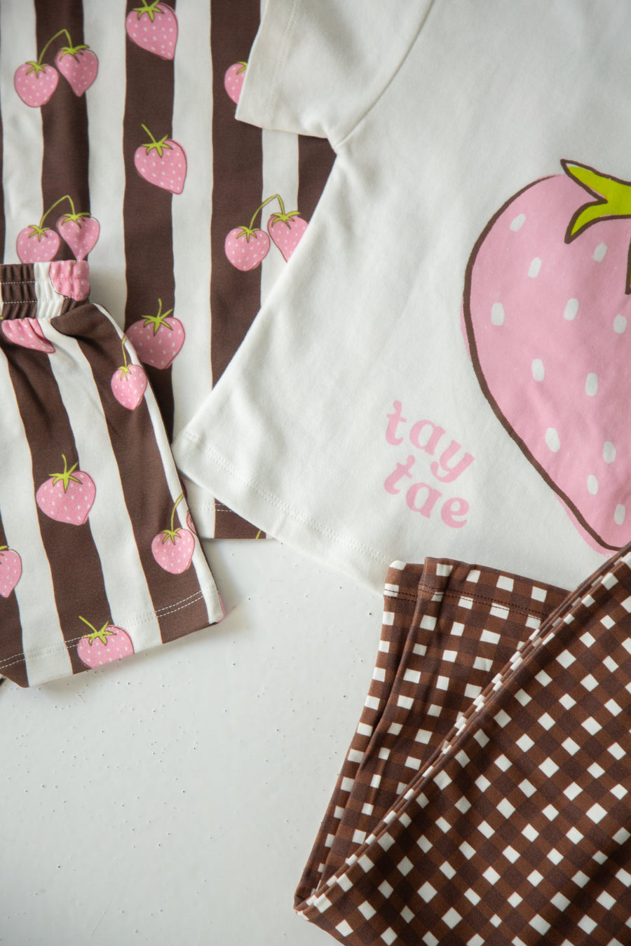 Close-up of the strawberry stripe fabric on the Berry Stripe Set